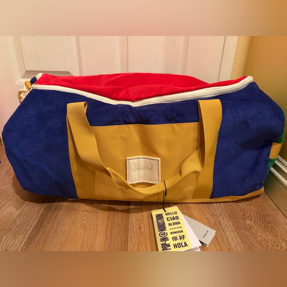 Herschel Supply Company Red, Blue, and Yellow Duffel Bag